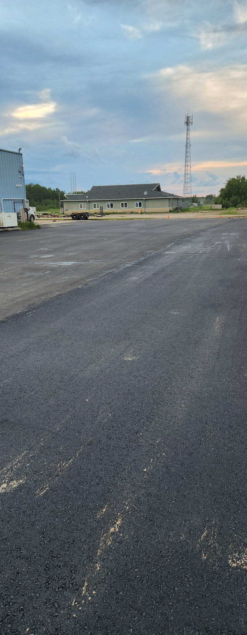 Clean asphalt edge against gravel