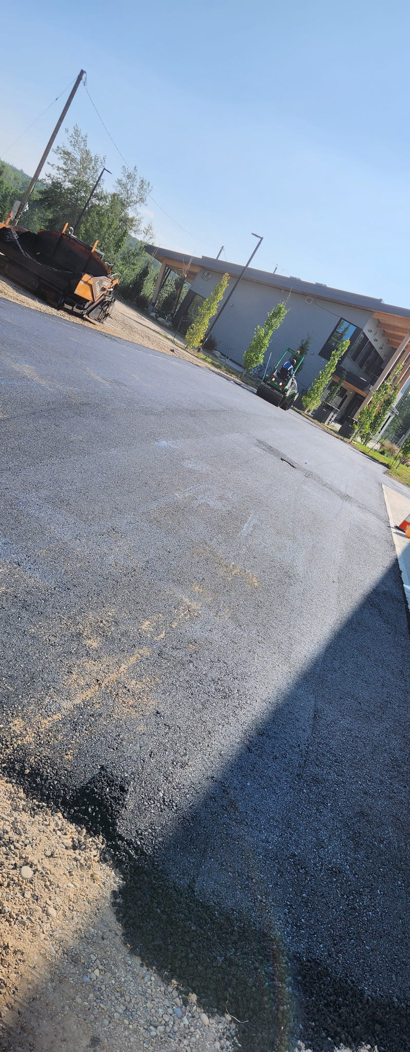 DLK paver and roller working on site